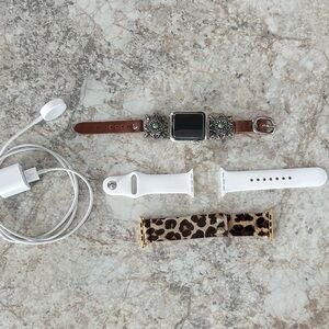 Apple Smartwatch with Brown and White Bands